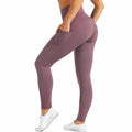 Legging femme taille S violet extensible à poches latérales pour sport